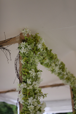 green and white wedding arch