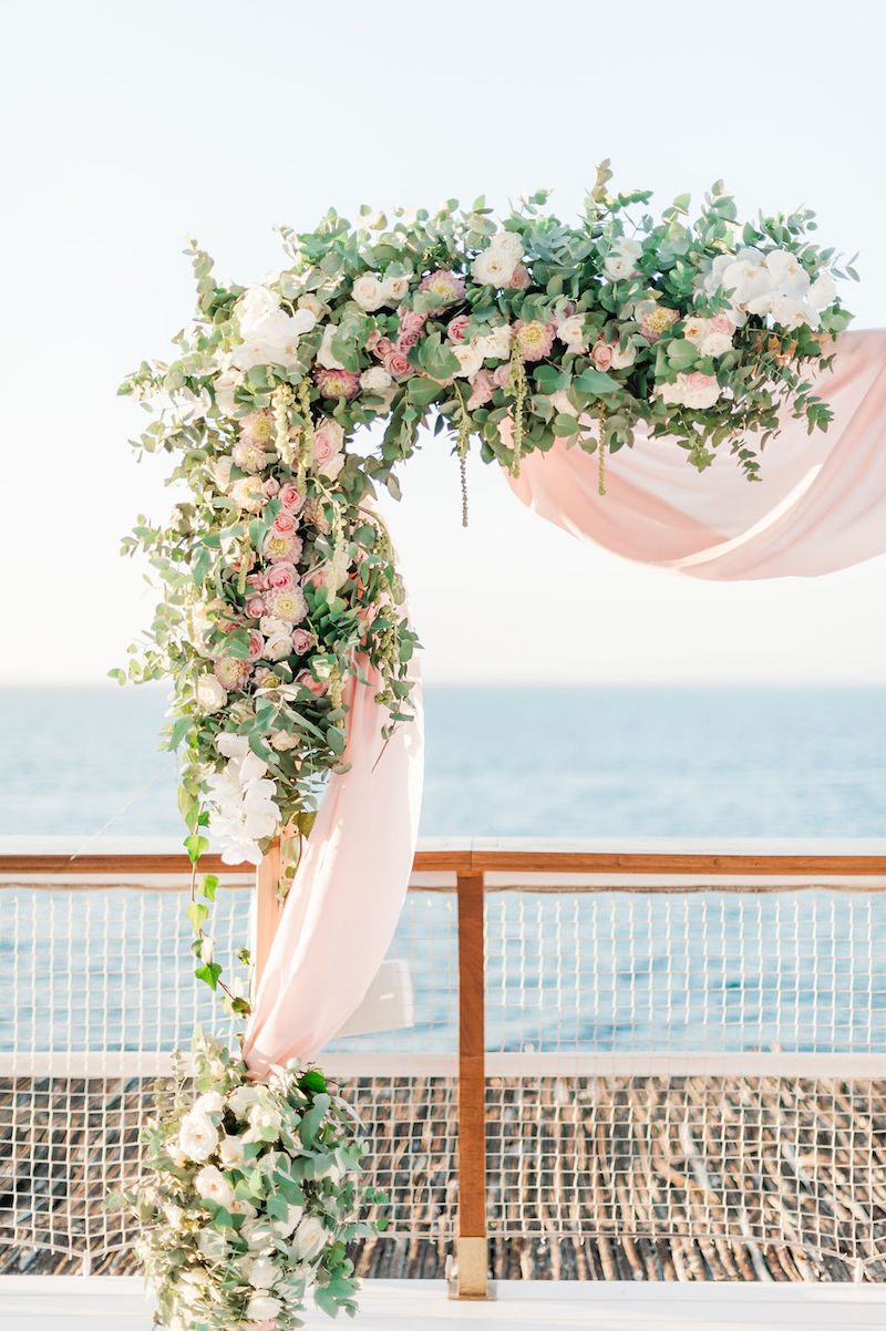 destination-wedding-capri-draped-floral-arch