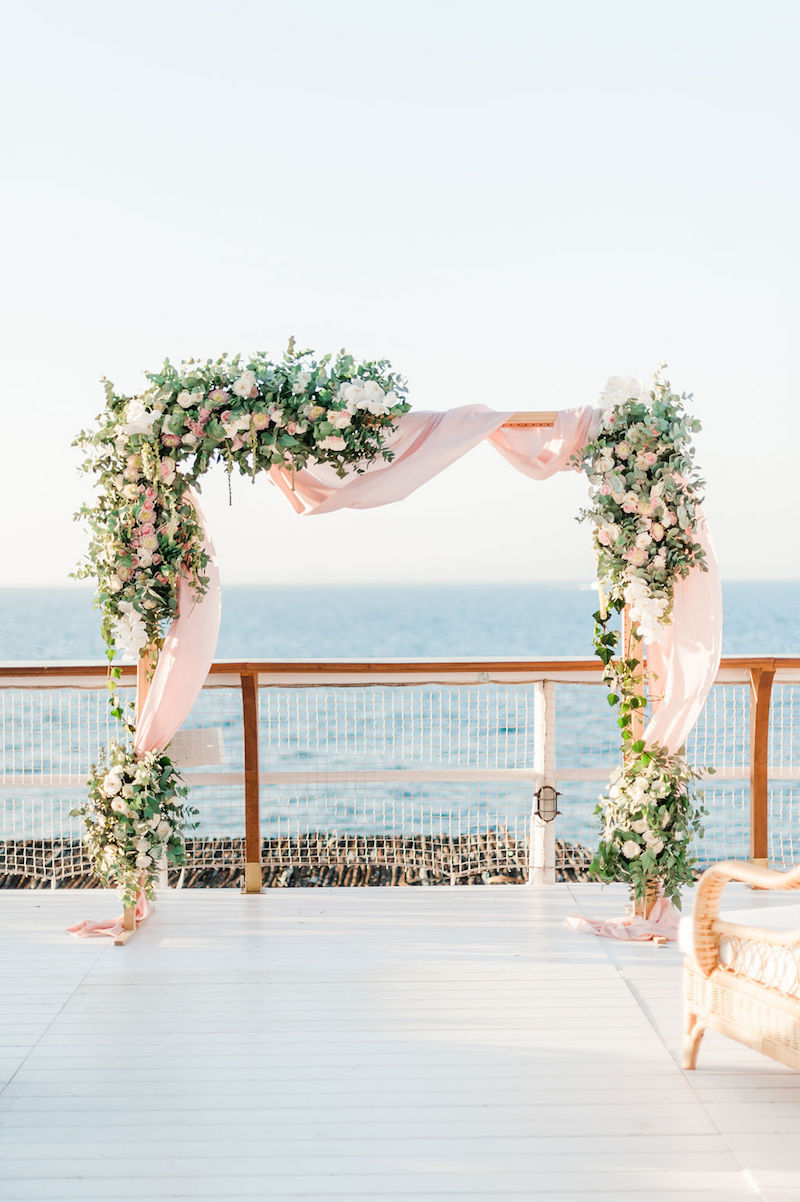 romantic-blush-italian-destination-wedding-capri-outdoor-wedding-floral-arch