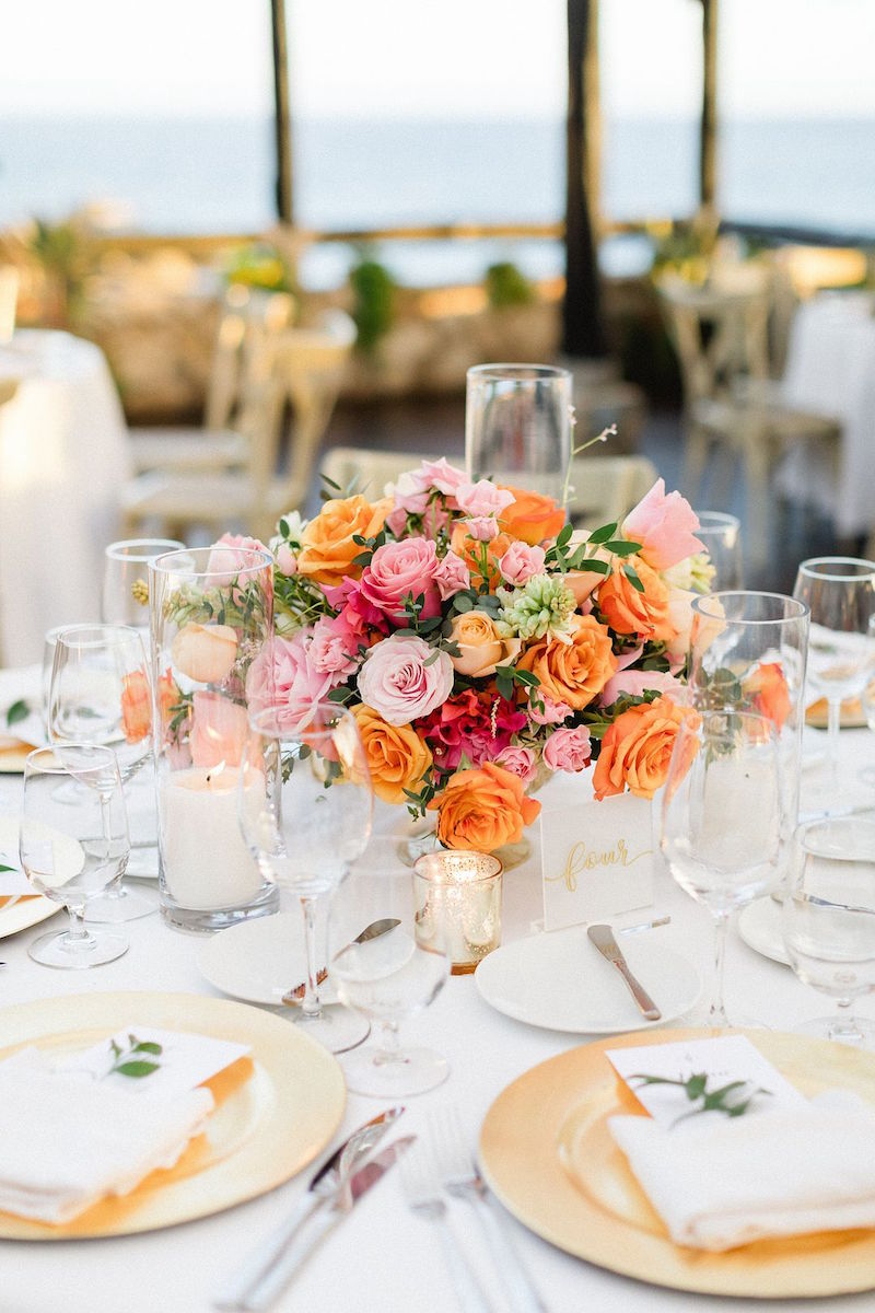 destination wedding in los cabos pink orange table décor centerpiece